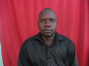 District Co-ordinator- Mr.Godfrey Ojuka Acuti